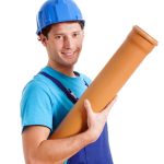 Blue collar worker with plastic pipe, isolated background